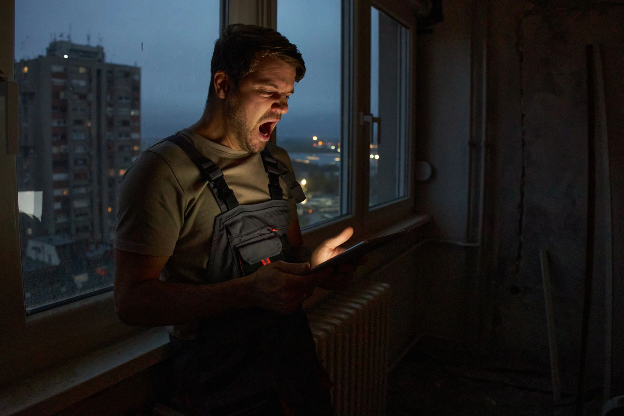 Homeowner reviewing home repair information on a tablet